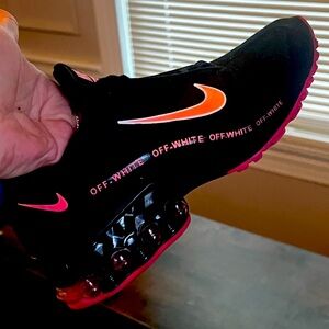 Black and pink women’s Nike shoes